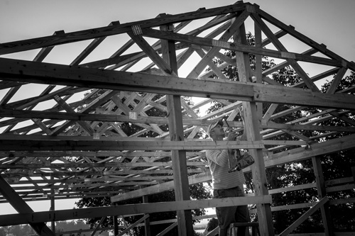 Black and white pole barn is an example of website photography in Michigan
