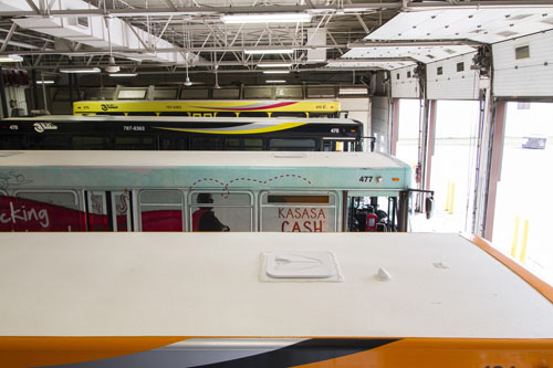 Buses line up in the Jackson Michigan Transit Authority garage during a website photo shoot