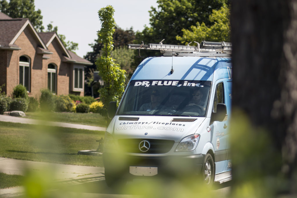 Doctor Flue photography of work vans