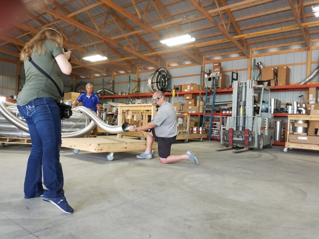 Photographer takes action shots onsite.