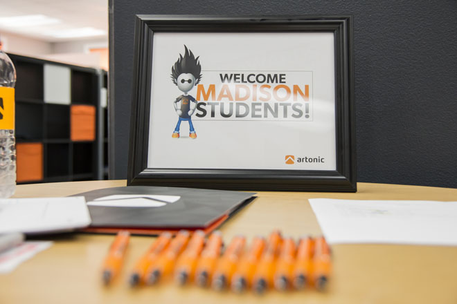 Image of Arty welcoming Madison Students is framed.