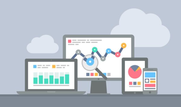 Website analytics concept with graphs, magnifying glass, and charts representing website visitor identification software