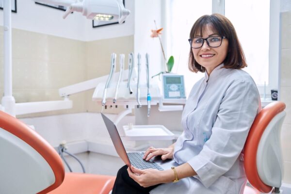 An orthodontist looking at their website and wondering what they can do to improve orthodontist SEO